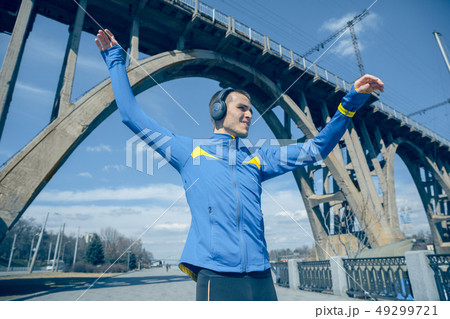 Man running on city background at morning 49299721