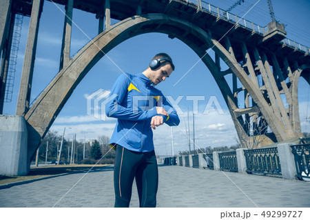 Man on city background at morning. Healthy lifestyle concept. 49299727