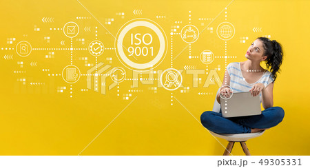 ISO 9001 with woman using a laptop ISO 9001 with woman using a laptop 49305331