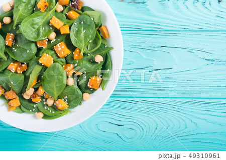 autumn salad with pumpkin , spinach , chickpea and 49310961