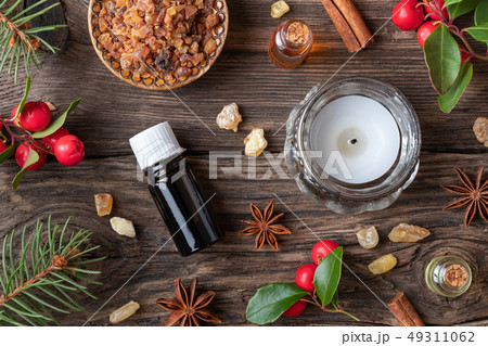 Christmas background with essential oils Christmas background with essential oils 49311062
