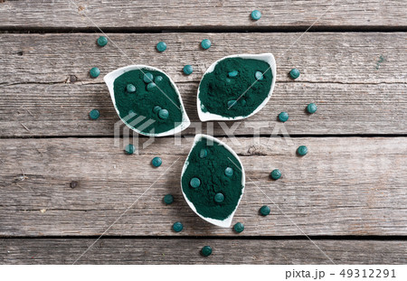 Ground spirulina and spirulina in pills 49312291