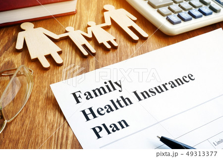 Family Health Insurance Plan in an office. 49313377
