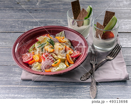 Easy Vegetable salad from zucchini, ice lettuce Easy Vegetable salad from zucchini, ice lettuce 49313698