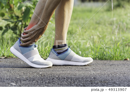 The female clings to a bad leg. The pain in her 49313907