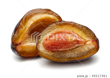 Two half Damson plums isolated on white 49317461
