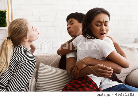 Girlfriend discovering her boyfriend cheating with her best friend Girlfriend discovering her boyfriend cheating with her best friend 49321282
