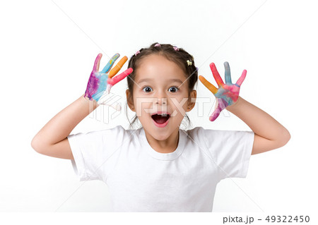 little child girl with hands painted in colorful paint little child girl with hands painted in colorful paint 49322450