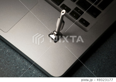 iron mini vacuum cleaner laptop marble background  49323177