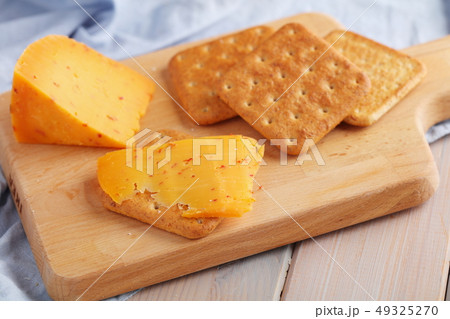 Crackers with spiced gouda cheese and cheese on Crackers with spiced gouda cheese and cheese on 49325270