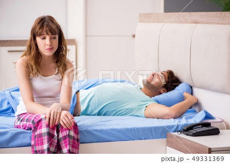 Young couple in the bedroom  49331369