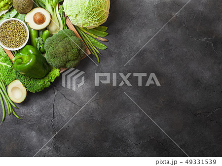 Assorted green toned raw organic vegetables 49331539