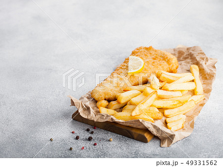 Traditional British Fish and Chips with lemon 49331562