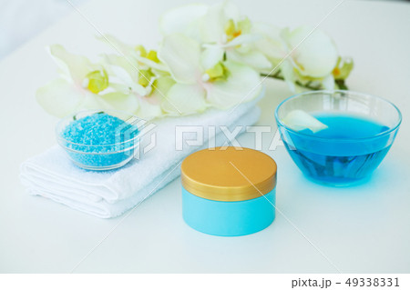 Spa. Blue Bath Salt Beauty Treatment on White Background Spa. Blue Bath Salt Beauty Treatment on White Background 49338331