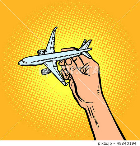 passenger plane in hand. metaphor of travel and tourism 49340194