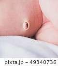 close up newborn navel baby belly button 49340736