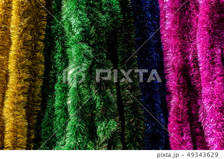 Various colored Christmas decorations in the view Various colored Christmas decorations in the view 49343629