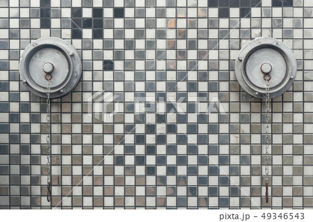 fire hydrants on the wall with mirrored mosaics day 49346543