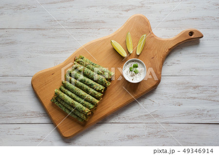 Pancake green rolls. Gluten free spinach pancakes. 49346914