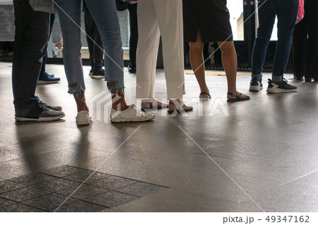 Queue of people in the row Queue of people in the row 49347162