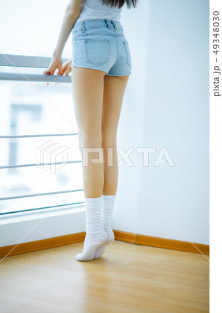 Young girl relaxing at home. Coquette girl resting in living room 49348030