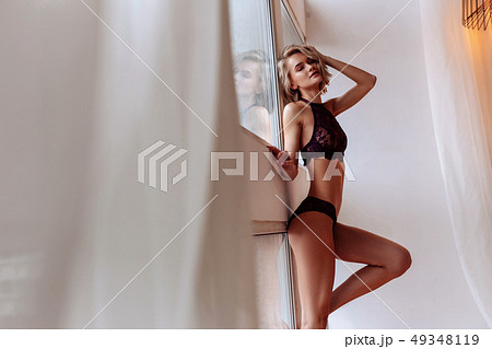 Model with long legs and amazing body posing in underwear Model with long legs and amazing body posing in underwear 49348119