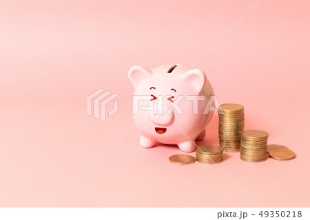 Piggy bank and money tower 49350218