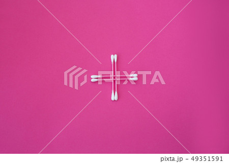 top view on four pink cotton buds with white heads top view on four pink cotton buds with white heads 49351591