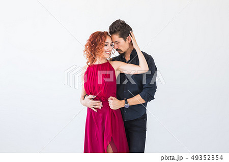 Social dance, bachata, kizomba, salsa, tango concept - Close up portrait of woman man dressed in Social dance, bachata, kizomba, salsa, tango concept - Close up portrait of woman man dressed in 49352354