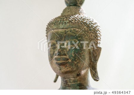 Face of Buddha image with copy space Face of Buddha image with copy space 49364347