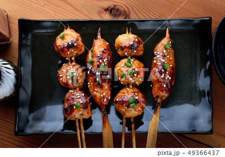 japanese meatball grill  or tsukune. 49366437