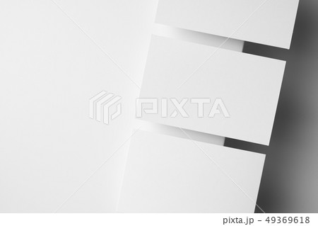 top view of 3 business card isolated on white 49369618