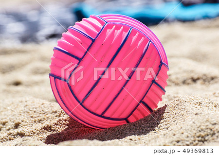 beach volleyball ball at the beach .Pink ball beach volleyball ball at the beach .Pink ball 49369813