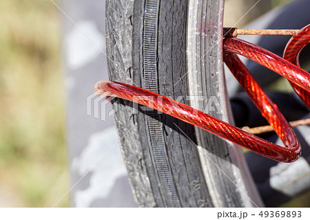 cable lock with a code on a mountain bike 49369893