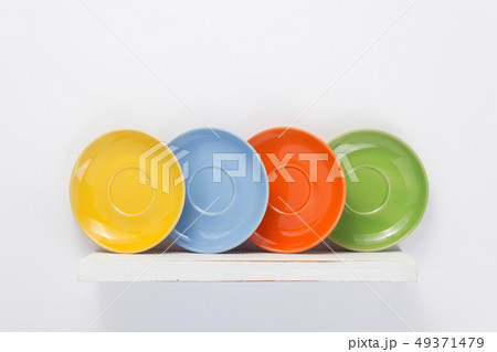 plate at wooden shelf plate at wooden shelf 49371479