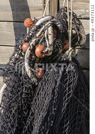 Detail of black fishing net. Detail of black fishing net. 49373112