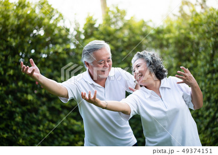 Asian Couple practicing Tai Chi. 49374151