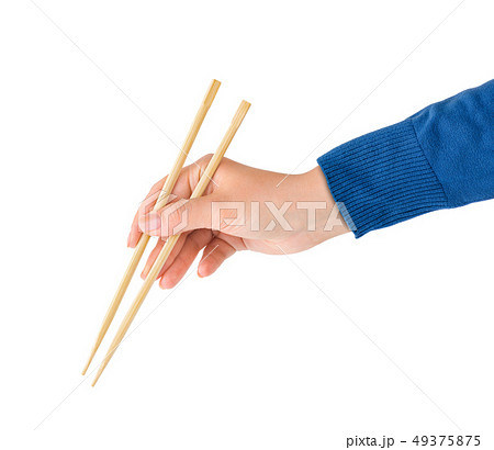 Hand with chopsticks 49375875