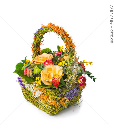 Flowers bouquet in basket 49375877