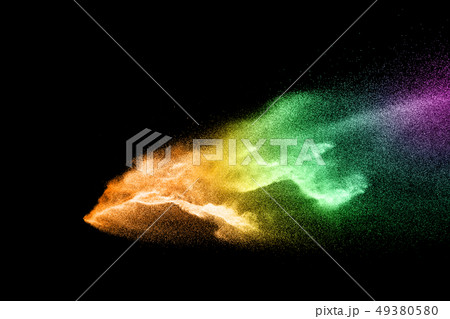 Abstract colorful powder explosion on black Abstract colorful powder explosion on black 49380580
