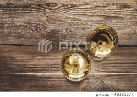 Two glasses of white wine Two glasses of white wine 49381977
