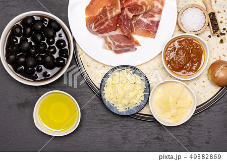 Recipe of pizza capriciosa on grey stone Recipe of pizza capriciosa on grey stone 49382869