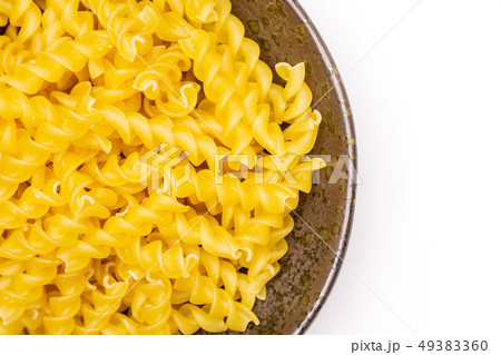 Raw italian torti pasta isolated on white Raw italian torti pasta isolated on white 49383360