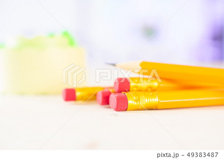 Yellow simple pencil with red tulips 49383487