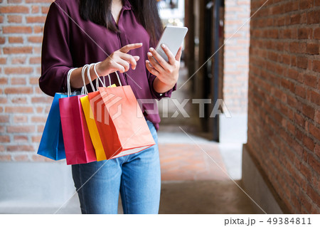 Consumerism, shopping, lifestyle concept, Young 49384811