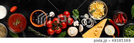 Pizza cooking ingredients, vegetables and cheese, top view 49385369
