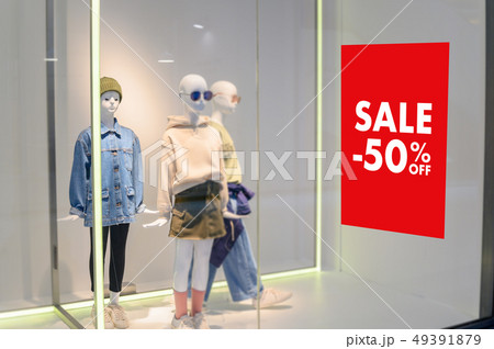 Department store with sale discount sign in shop Department store with sale discount sign in shop 49391879