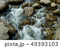 running of water stream from waterfall in tropical 49393103