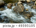 running of water stream from waterfall in tropical 49393105