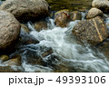 running of water stream from waterfall in tropical 49393106